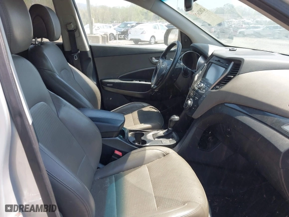 2013 Hyundai Santa Fe 2.0T Sport with VIN 5XYZWDLAXDG057954, listed as a IAAI auction lot 42082667 with 186,678 mi miles. Bid and sale history available at carsss.com. Image 5.