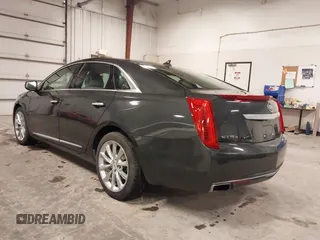 2013 Cadillac XTS Luxury with VIN 2G61R5S32D9101909, listed as a IAAI auction lot 41461611 with 110,603 mi miles. Bid and sale history available at carsss.com. Image 3.