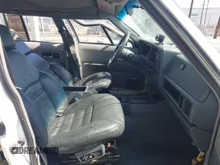 1991 Jeep Cherokee Country z VIN 1J4FJ78S7ML632675, wystawiony jako IAAI lot #42283175 z przebiegiem 116 062 mil mil oraz . Historia ofert i sprzedaży dostępna na DreamBid. Obrazek 5.
