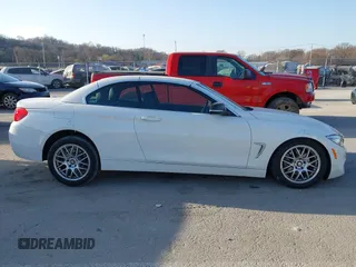 2015 BMW 4 Series 428i xDrive with VIN WBA3T1C51FP821140, listed as a IAAI auction lot 41802697 with 95,232 mi miles and . Bid and sale history available at carsss.com. Image 13.