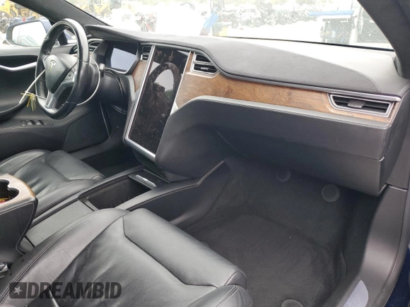 2017 Tesla Model S 100D z VIN 5YJSA1E20HF192300, wystawiony jako Copart lot #52931815 z przebiegiem 93 916 mil mil oraz Szkoda całkowita • Salvage title. Historia ofert i sprzedaży dostępna na DreamBid. Obrazek 8.