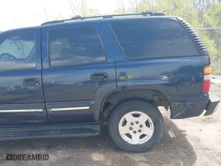 2004 Chevrolet Tahoe LT with VIN 1GNEC13Z84R209220, listed as a IAAI auction lot 41867643 with 385,229 mi miles. Bid and sale history available at carsss.com. Image 16.