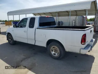 2003 Ford F-150 XL z VIN 2FTRX17253CA75533, wystawiony jako Copart lot #57361145 z przebiegiem 220 482 mil mil oraz Szkoda całkowita • Salvage title. Historia ofert i sprzedaży dostępna na DreamBid. Obrazek 2.