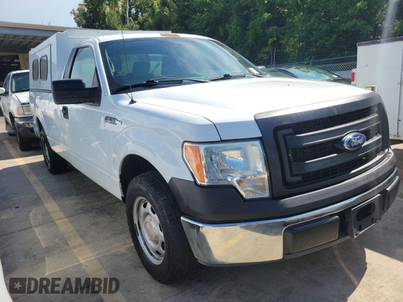 2014 Ford F-150 XL with VIN 1FTMF1CM6EKD62026, listed as a IAAI auction lot 42812805 with 143,144 mi miles and . Bid and sale history available at DreamBid. Image 13.