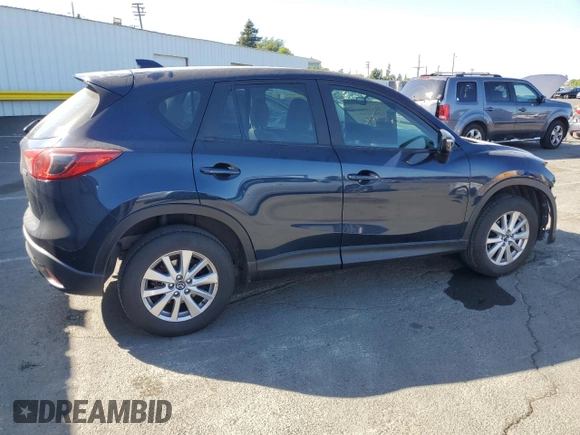 2015 Mazda CX-5 Sport with VIN JM3KE2BEXF0483141, listed as a Copart auction lot 59134105 with 71,727 mi miles and Salvage title. Bid and sale history available at DreamBid. Image 3.