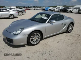 2007 Porsche 718 Cayman z VIN WP0AA29837U763526, wystawiony jako Copart lot #77588774 z przebiegiem 57 491 mil mil oraz Szkoda całkowita • Salvage title. Historia ofert i sprzedaży dostępna na DreamBid. Obrazek 1.