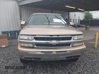 2005 Chevrolet Suburban LT z VIN 1GNFK16Z35J213484, wystawiony jako IAAI lot #42251630 z przebiegiem 384 604 mil mil oraz . Historia ofert i sprzedaży dostępna na DreamBid. Obrazek 14.