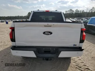 2024 Ford F-150 Lightning Flash z VIN 1FT6W3L70RWG21137, wystawiony jako Copart lot #48894615 z przebiegiem Nie podano mil oraz Szkoda całkowita • Salvage title. Historia ofert i sprzedaży dostępna na DreamBid. Obrazek 6.