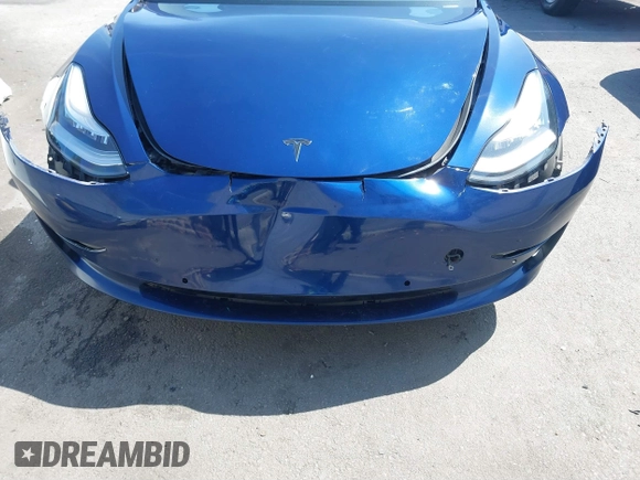 2018 Tesla Model 3 Long Range Battery with VIN 5YJ3E1EA1JF014630, listed as a IAAI auction lot 41877296 with 137,294 mi miles and . Bid and sale history available at DreamBid. Image 6.