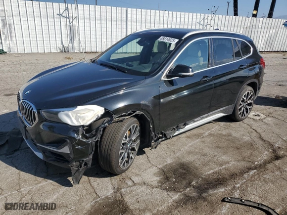 2021 BMW X1 sDrive28i with VIN WBXJG7C0XM5T77130, listed as a Copart auction lot 88814925 with 54,718 mi miles and Salvage Title. Bid and sale history available at carsss.com. Image 1.