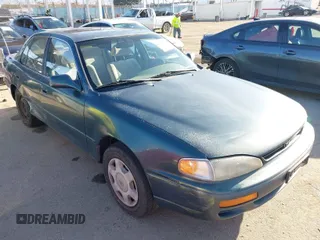 1996 Toyota Camry LE z VIN JT2BF12K2T0173799, wystawiony jako IAAI lot #41955000 z przebiegiem 284 381 mil mil oraz . Historia ofert i sprzedaży dostępna na DreamBid. Obrazek 1.