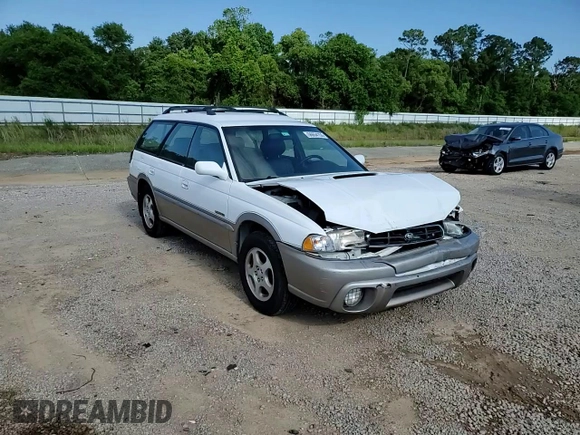 1999 Subaru Legacy Outback with VIN 4S3BG6850X7649578, listed as a Copart auction lot 56654155 with 174,651 mi miles and Salvage title. Bid and sale history available at DreamBid. Image 14.