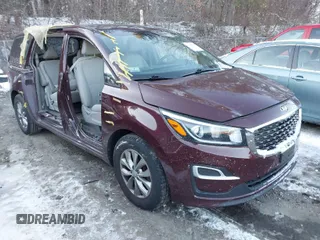 2020 Kia Sedona LX with VIN KNDMB5C18L6617371, listed as a IAAI auction lot 41378524 with 59,092 mi miles. Bid and sale history available at carsss.com. Image 1.