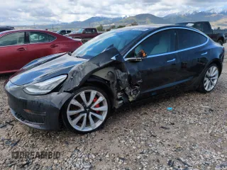 2018 Tesla Model 3 Long Range Battery z VIN 5YJ3E1EB6JF171076, wystawiony jako Copart lot #57524695 z przebiegiem 83 947 mil mil oraz Szkoda całkowita • Salvage title. Historia ofert i sprzedaży dostępna na DreamBid. Obrazek 1.