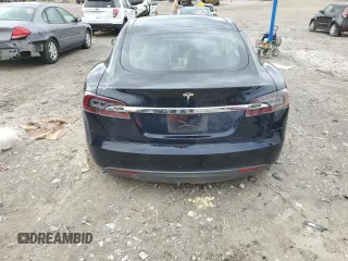 2013 Tesla Model S с VIN 5YJSA1DN9DFP01855, выставлен на аукционе Copart как лот 51257955 с пробегом 187 251 миль миль и Чистый • Clean title. История ставок и продаж доступна на DreamBid. Изображение 6.