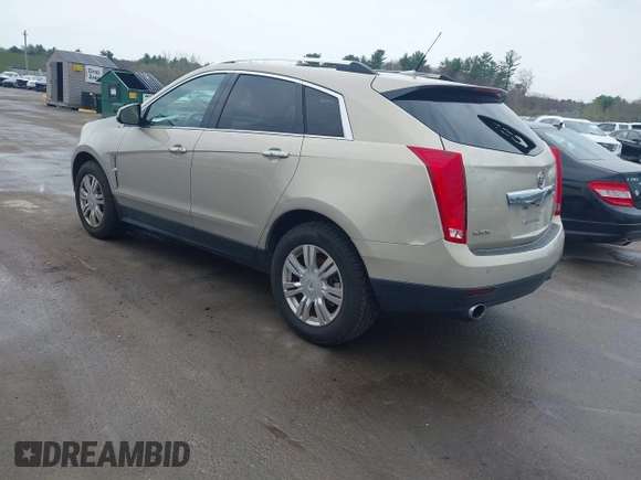 2011 Cadillac SRX Luxury Collection with VIN 3GYFNAEY4BS663447, listed as a IAAI auction lot 42134933 with 153,411 mi miles and . Bid and sale history available at DreamBid. Image 3.