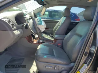 2005 Toyota Camry LE with VIN 4T1BE30K15U502945, listed as a Copart auction lot 62761625 with 235,877 mi miles and Salvage title. Bid and sale history available at DreamBid. Image 7.