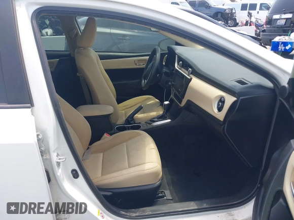 2018 Toyota Corolla L with VIN 5YFBURHE7JP810444, listed as a IAAI auction lot 42558647 with 74,794 mi miles and . Bid and sale history available at DreamBid. Image 5.