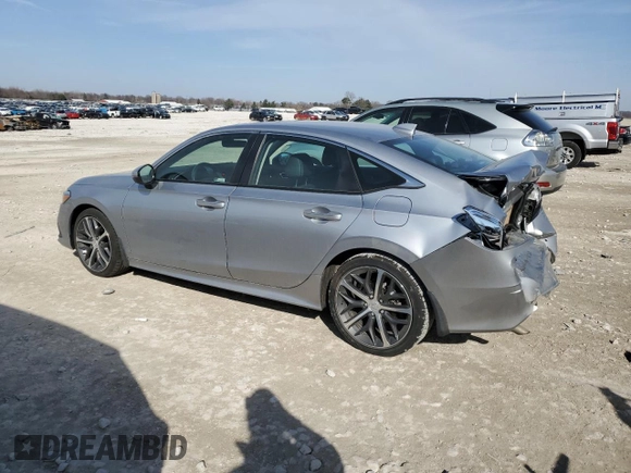 2023 Honda Civic Touring z VIN 2HGFE1F97PH323539, wystawiony jako Copart lot #48790795 z przebiegiem 24 049 mil mil oraz Szkoda całkowita • Salvage title. Historia ofert i sprzedaży dostępna na DreamBid. Obrazek 2.