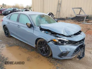 2022 Honda Civic Si with VIN 2HGFE1E5XNH470420, listed as a IAAI auction lot 41610704 with 72,293 mi miles and . Bid and sale history available at DreamBid. Image 1.