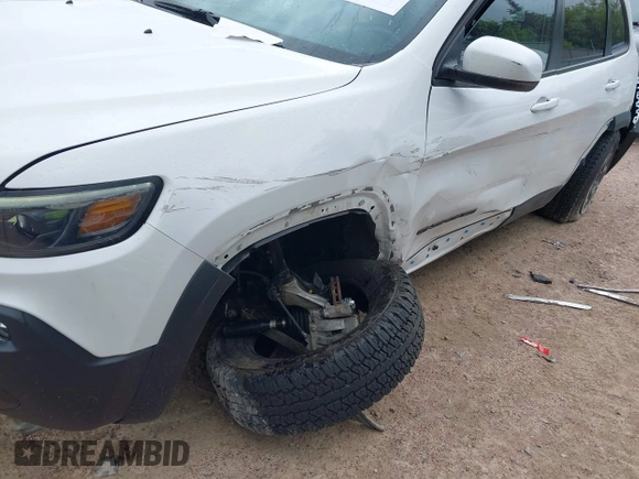 2020 Jeep Cherokee Latitude with VIN 1C4PJMCXXLD578180, listed as a IAAI auction lot 42438023 with 82,845 mi miles and . Bid and sale history available at DreamBid. Image 6.