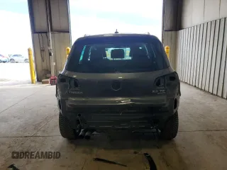 2015 Volkswagen Tiguan SE z VIN WVGBV7AX0FW588451, wystawiony jako Copart lot #51005345 z przebiegiem 104 553 mil mil oraz Szkoda całkowita • Salvage title. Historia ofert i sprzedaży dostępna na DreamBid. Obrazek 6.