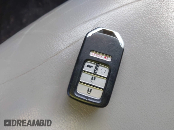 2018 Honda Pilot EX-L with VIN 5FNYF6H57JB007065, listed as a IAAI auction lot 41418432 with 123,806 mi miles. Bid and sale history available at carsss.com. Image 11.