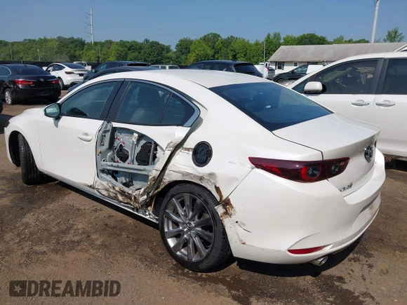 2022 Mazda 3 Carbon Edition with VIN 3MZBPACL0NM318573, listed as a IAAI auction lot 42403393 with 8,762 mi miles and . Bid and sale history available at DreamBid. Image 6.