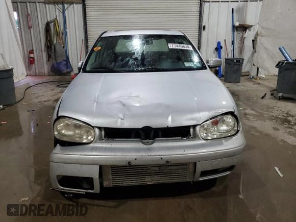 2001 Volkswagen Golf z VIN 9BWGD61J714058300, wystawiony jako Copart lot #77449634 z przebiegiem 137 048 mil mil oraz Szkoda całkowita • Salvage title. Historia ofert i sprzedaży dostępna na DreamBid. Obrazek 5.