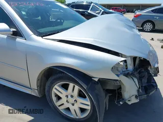 2014 Chevrolet Impala LT z VIN 2G1WB5E31E1180551, wystawiony jako IAAI lot #42386442 z przebiegiem 130 545 mil mil oraz . Historia ofert i sprzedaży dostępna na DreamBid. Obrazek 19.