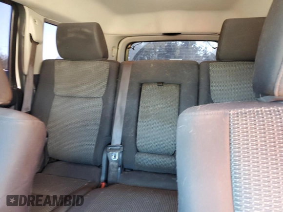 2010 Jeep Commander Sport with VIN 1J4RH4GK9AC113888, listed as a Copart auction lot 84553544 with 208,109 mi miles and Salvage title. Bid and sale history available at DreamBid. Image 10.