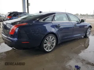 2015 Jaguar XJ Portfolio with VIN SAJWJ2GD2F8V90287, listed as a Copart auction lot 50291095 with 46,917 mi miles and Salvage title. Bid and sale history available at DreamBid. Image 3.