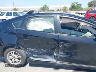 2011 Toyota Prius I with VIN JTDKN3DU3B1383339, listed as a IAAI auction lot 42086995 with 246,239 mi miles. Bid and sale history available at carsss.com. Image 6.