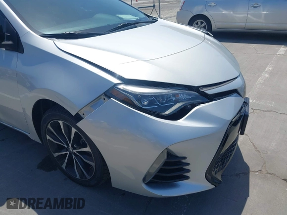 2019 Toyota Corolla L with VIN 5YFBURHE5KP877691, listed as a IAAI auction lot 42108591 with 85,813 mi miles and . Bid and sale history available at DreamBid. Image 17.