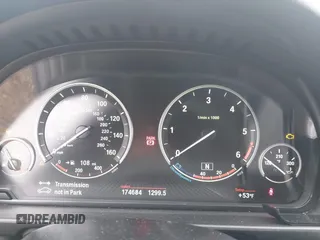 2014 BMW 5 Series 535d with VIN WBAXA5C51ED691018, listed as a IAAI auction lot 41887112 with 174,684 mi miles and . Bid and sale history available at carsss.com. Image 7.