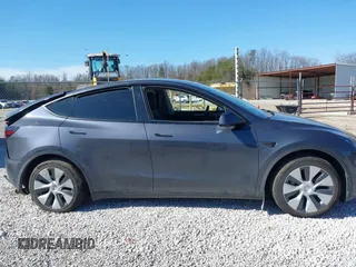2023 Tesla Model Y Long Range with VIN 7SAYGAEE7PF971620, listed as a IAAI auction lot 41654688 with Not Provided miles and . Bid and sale history available at DreamBid. Image 14.