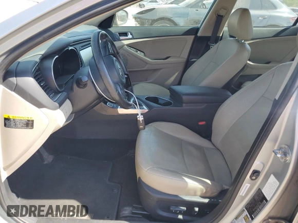 2014 Kia Optima EX with VIN KNAGN4ADXE5070086, listed as a Copart auction lot 61226415 with 148,603 mi miles and Salvage title. Bid and sale history available at DreamBid. Image 7.