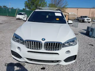 2015 BMW X5 xDrive50i with VIN 5UXKR6C5XF0J76697, listed as a IAAI auction lot 41953074 with 141,377 mi miles and . Bid and sale history available at DreamBid. Image 11.