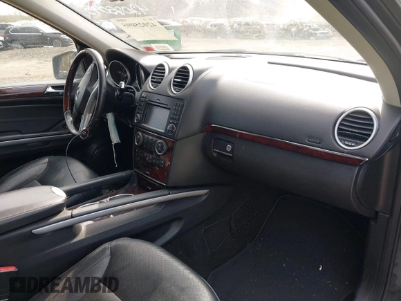 2011 Mercedes-Benz GL-Class GL 550 with VIN 4JGBF8GEXBA634772, listed as a IAAI auction lot 42025095 with 183,986 mi miles. Bid and sale history available at carsss.com. Image 5.