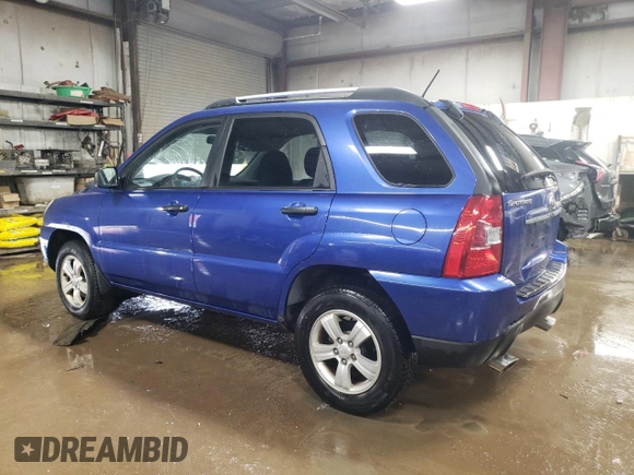 2009 Kia Sportage LX with VIN KNDJF724197557676, listed as a Copart auction lot 51774565 with 172,768 mi miles and Salvage Title. Bid and sale history available at carsss.com. Image 2.