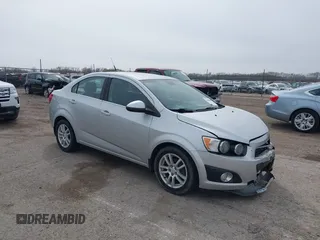 2012 Chevrolet Sonic LT with VIN 1G1JC5SHXC4170853, listed as a IAAI auction lot 41941069 with 130,917 mi miles and . Bid and sale history available at DreamBid. Image 1.