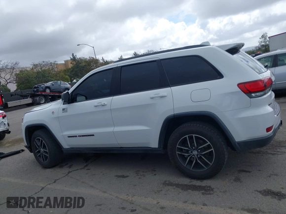 2018 Jeep Grand Cherokee Trailhawk with VIN 1C4RJFLT2JC137793, listed as a IAAI auction lot 41697299 with 149,100 mi miles and . Bid and sale history available at DreamBid. Image 14.