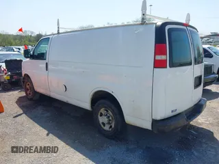 2012 Chevrolet Express Cargo Van with VIN 1GCWGFCA6C1147841, listed as a IAAI auction lot 42042056 with 248,374 mi miles. Bid and sale history available at carsss.com. Image 3.