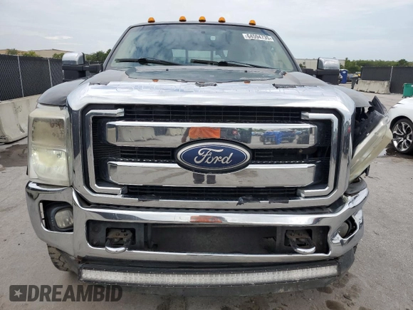 2011 Ford F-250 XL with VIN 1FT7W2BT4BEB22981, listed as a Copart auction lot 64594735 with 381,861 mi miles and Salvage title. Bid and sale history available at DreamBid. Image 5.