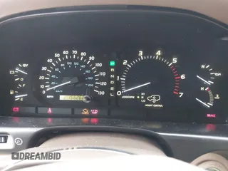 2000 Lexus LX 470 z VIN JT6HT00W8Y0092556, wystawiony jako IAAI lot #41727615 z przebiegiem 156 262 mil mil oraz . Historia ofert i sprzedaży dostępna na DreamBid. Obrazek 7.