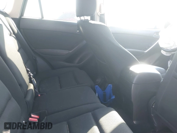 2016 Mazda CX-5 Touring with VIN JM3KE2CY6G0808992, listed as a IAAI auction lot 40969655 with 132,513 mi miles. Bid and sale history available at carsss.com. Image 8.