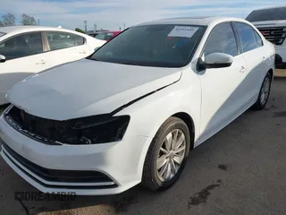 2016 Volkswagen Jetta Sedan 1.4T SE with VIN 3VWD67AJXGM365869, listed as a IAAI auction lot 41261109 with 59,325 mi miles. Bid and sale history available at carsss.com. Image 2.
