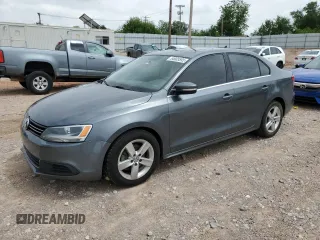 2014 Volkswagen Jetta TDI w/Premium с VIN 3VWLL7AJ7EM313598, выставлен на аукционе Copart как лот 54905595 с пробегом 162 036 миль миль и Списание • Salvage title. История ставок и продаж доступна на DreamBid. Изображение 1.