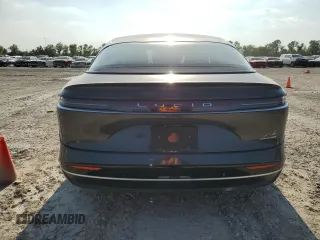 2023 Lucid Air Grand Touring z VIN 50EA1GBA6PA003159, wystawiony jako Copart lot #66084314 z przebiegiem Nie podano mil oraz Szkody całkowita. Historia ofert i sprzedaży dostępna na DreamBid. Obrazek 6.