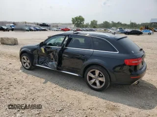 2015 Audi allroad Premium Plus with VIN WA1UFAFLXFA021703, listed as a Copart auction lot 64302004 with 119,664 mi miles and Salvage Title. Bid and sale history available at carsss.com. Image 2.